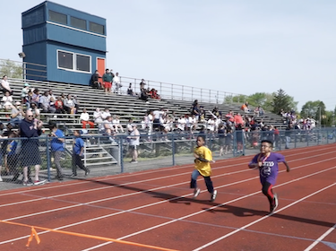 CCS Special Olympics Athletes Running Track